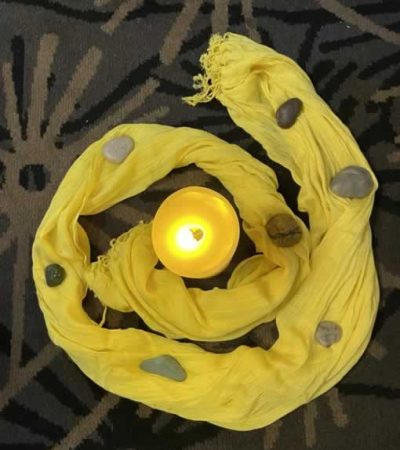 yellow scarf with candle